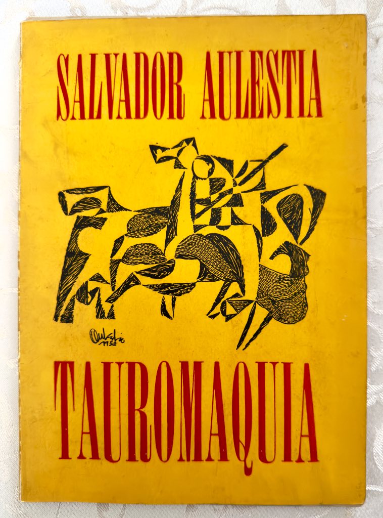 Yellow cover of Tauromaquia by Salvador Aulestia featuring a Cubist-Expressionist ink drawing of a bullfight scene, signed an