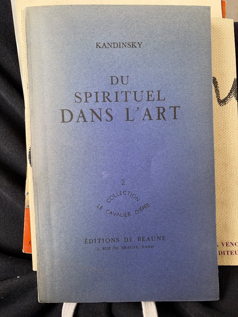 Blue-grey paper wrappers of Kandinsky's Du Spirituel dans l'Art, 1949 French edition, Le Cavalier d'Épée collection number tw